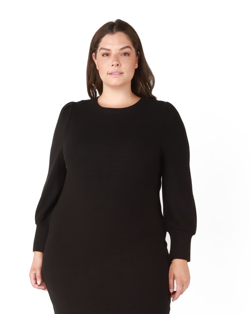 Front of a model wearing a size 0X Chloe Puff Sleeve Dress in Black by DEX PLUS. | dia_product_style_image_id:239802